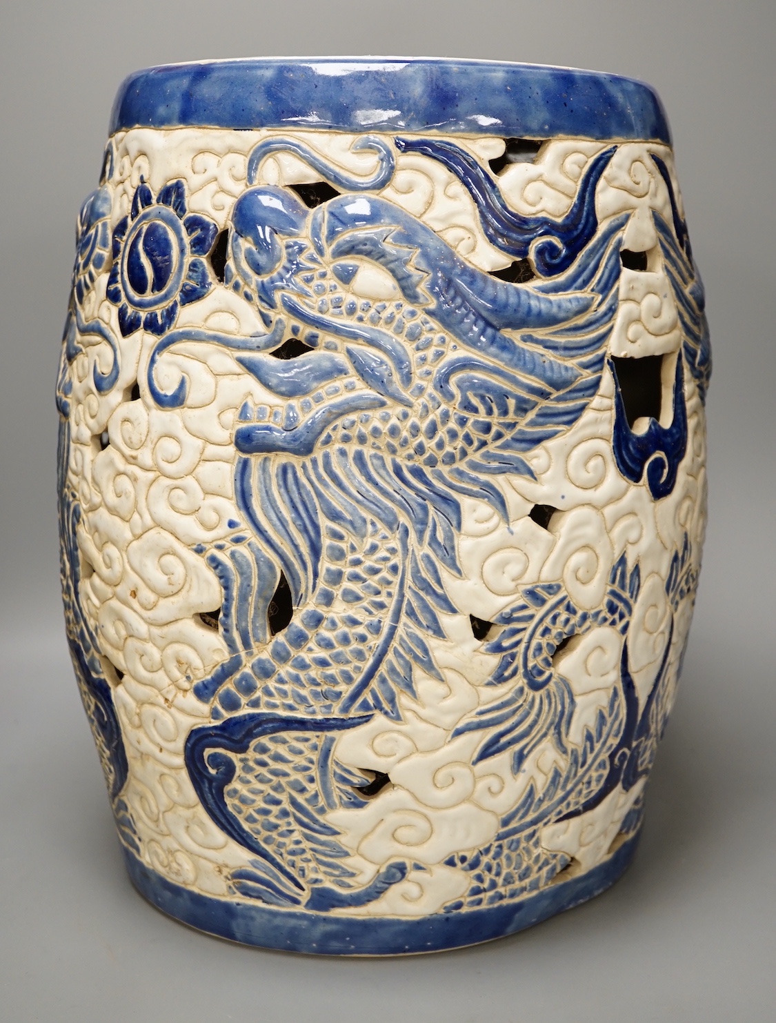 A pierced Chinese stoneware garden seat 42cm